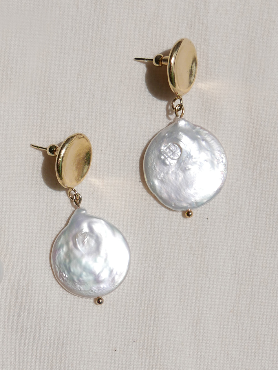 flat pearl earring