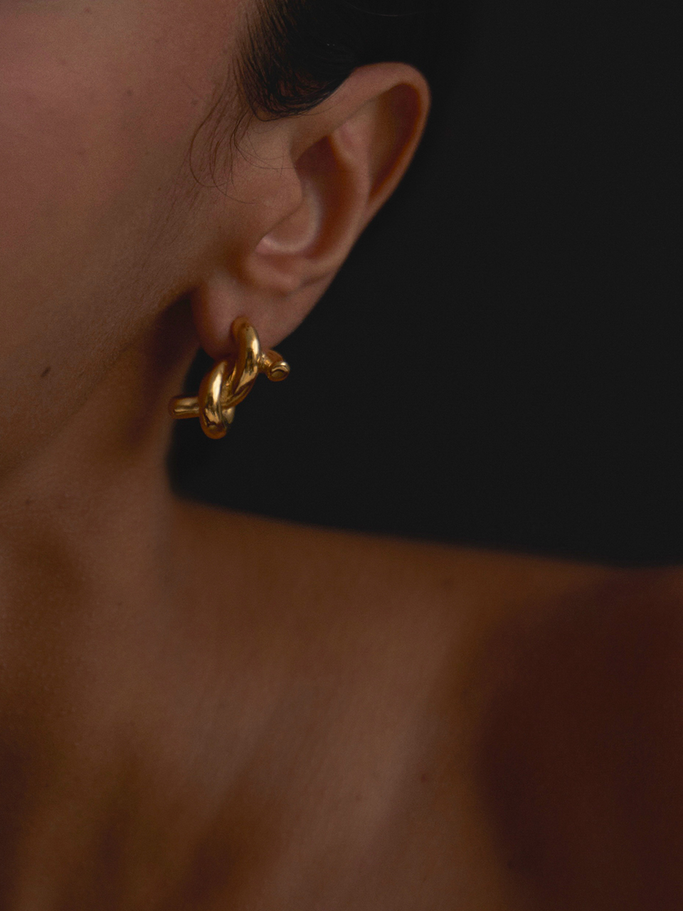 Bold twist goldtone earring